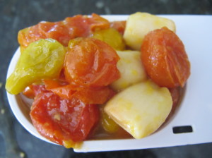 Roasted tomatoes and garlic.  Good enough to eat out of the roasting pan!